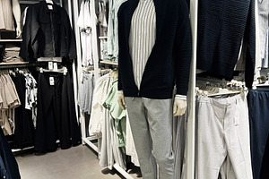 Mannequin wearing casual modern outfit in an elegant clothing store, a Photo by AS photostudio