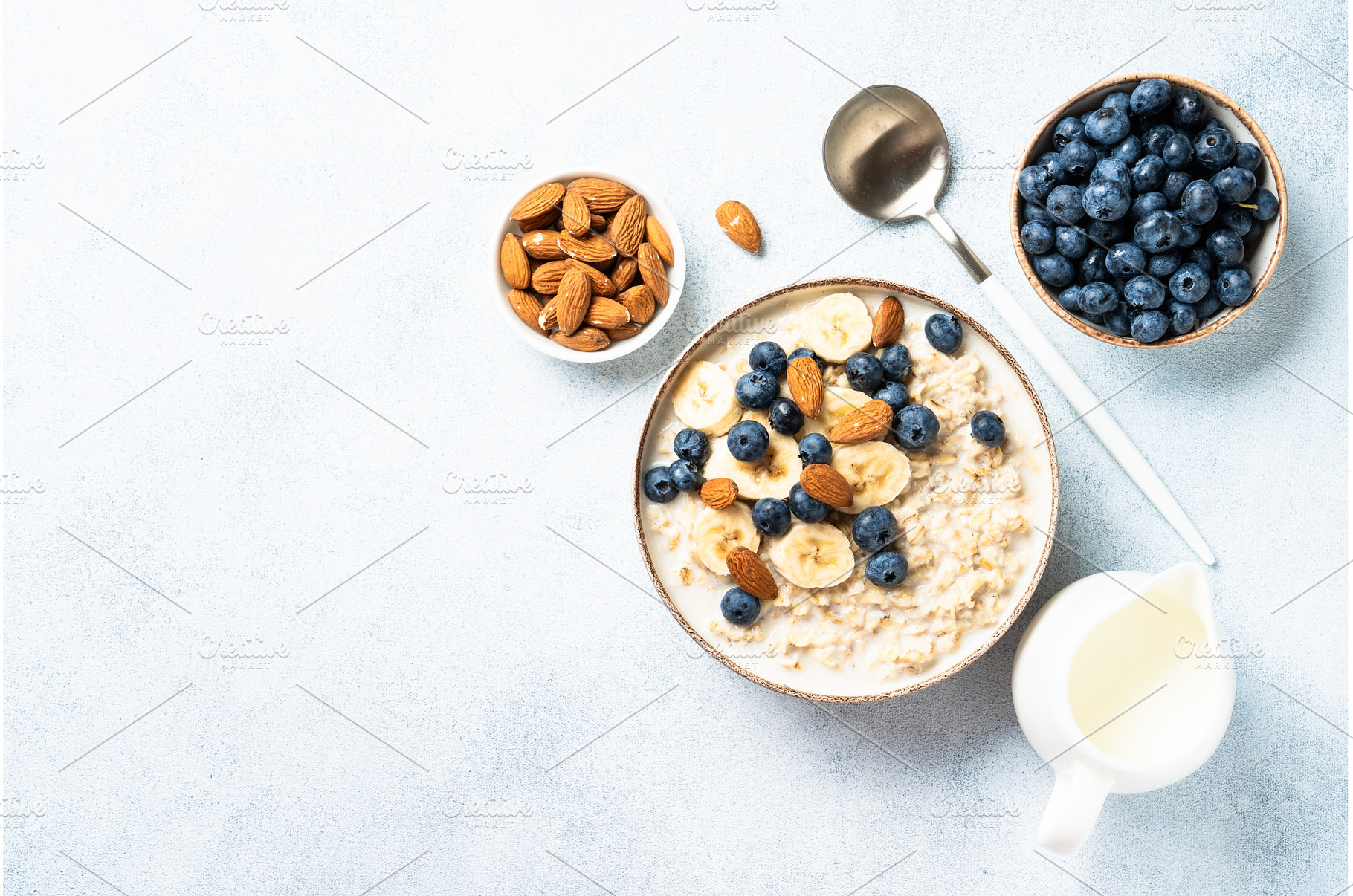 Oatmeal porridge with milk, bananas, a Food & Drink Photo by Nadia-nb