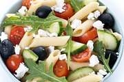 Mediterranean Pasta Salad in bowl with Fresh Vegetables and Herbs isolated on w, a Food & Drink Photo by etorres69 (Thumbnail 1 of 2)