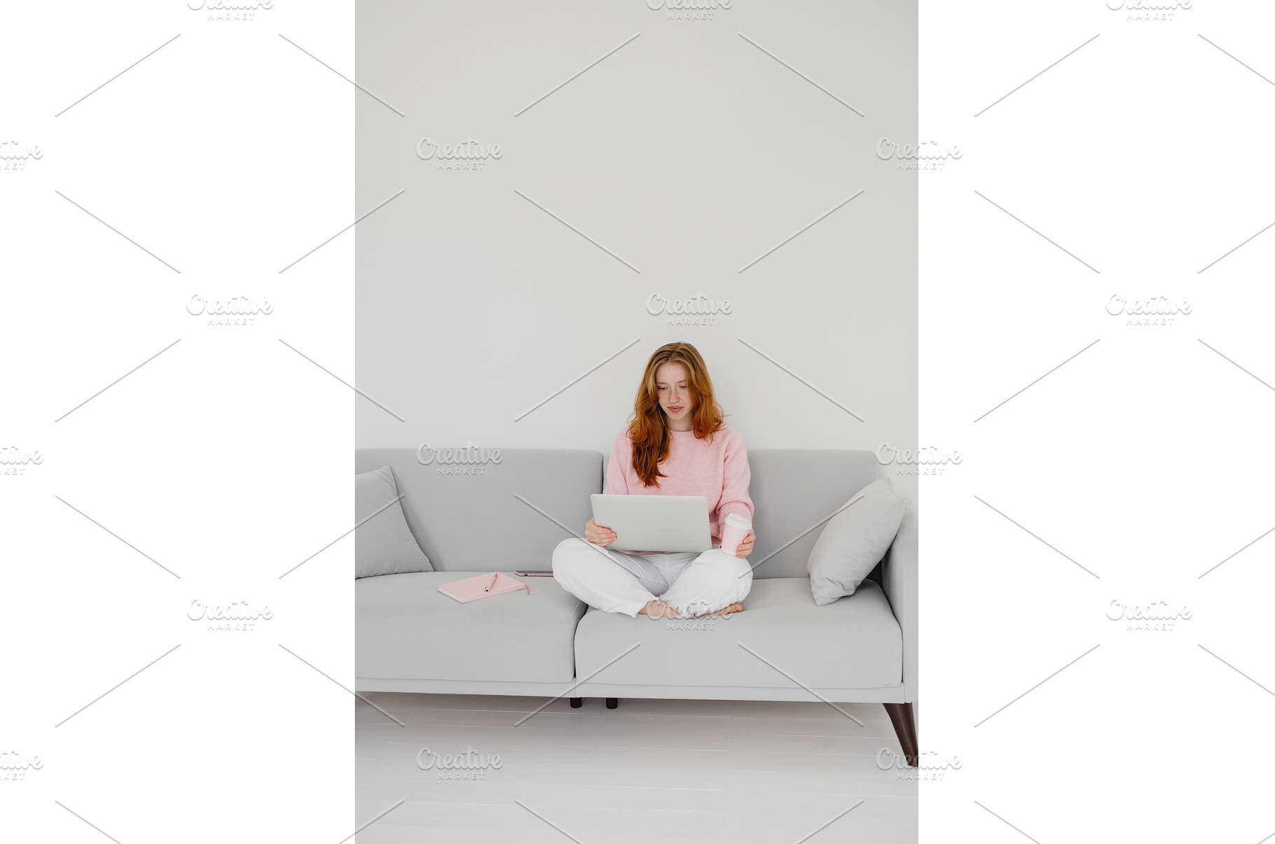 Beautiful young redhead woman using, a Person Photo by Aliona Serzhanova