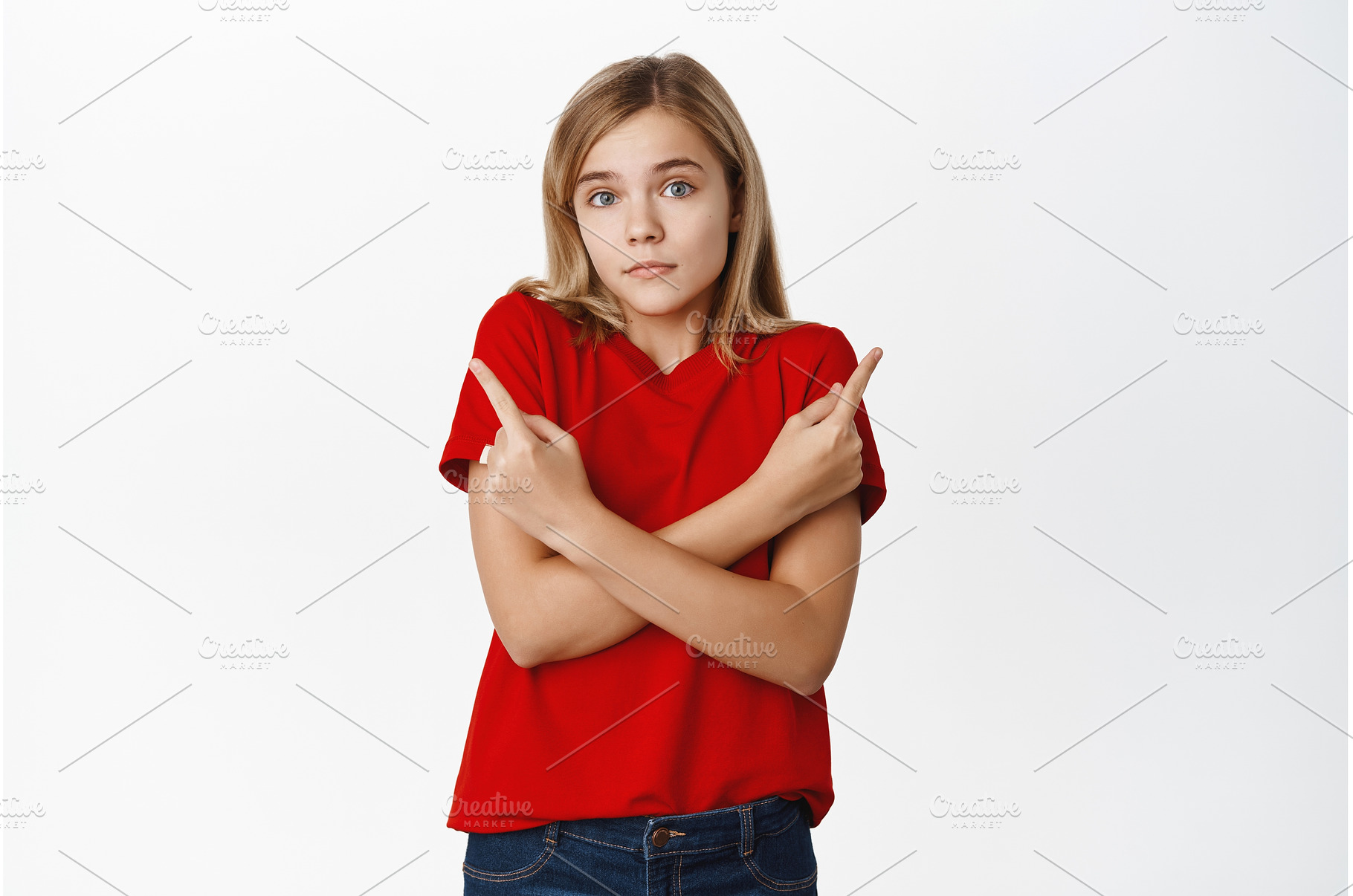 Indecisive little girl shrugs and, a Person Photo by Cookie Studio