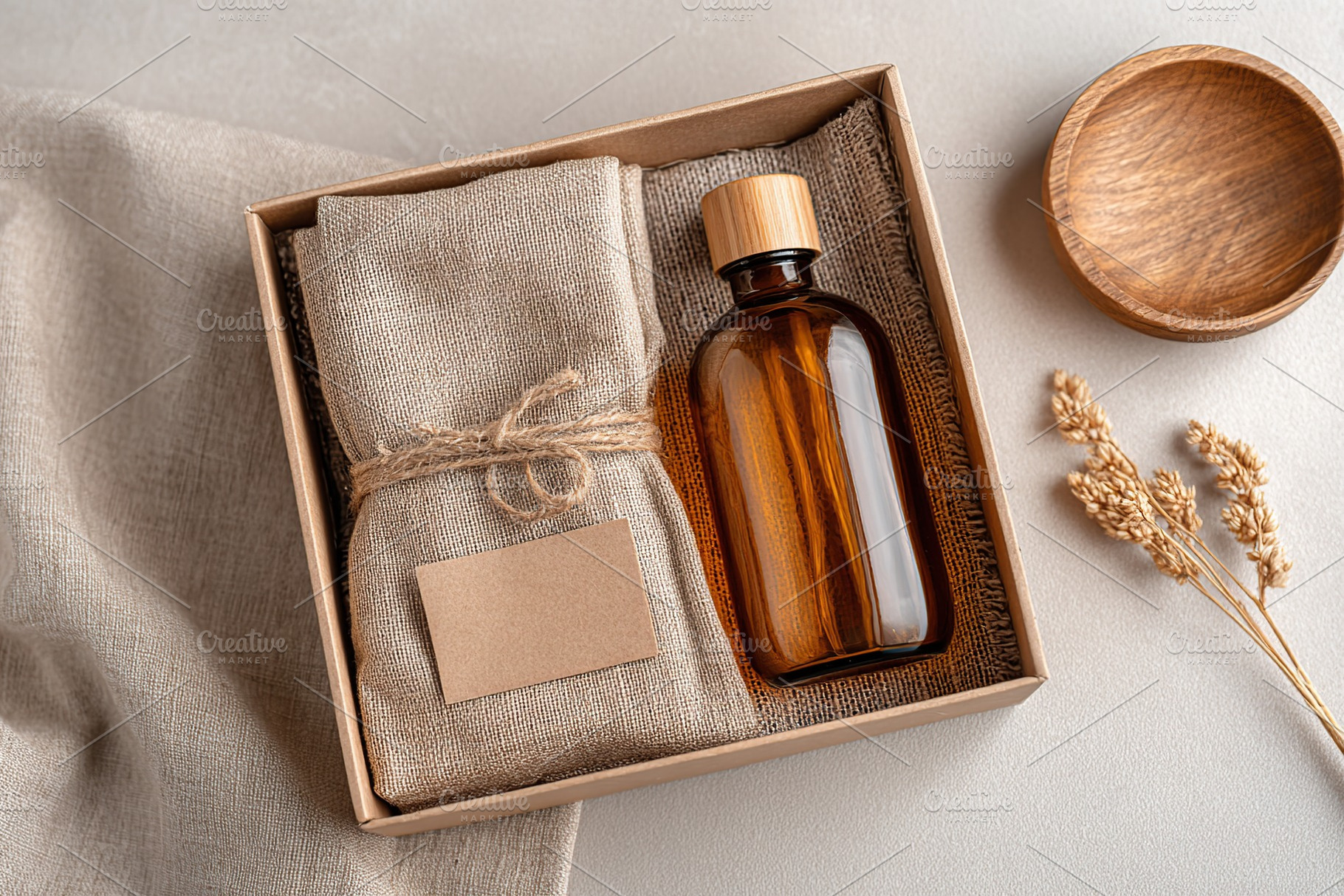 Eco-friendly gift box with amber bottle and burlap, a Beauty & Fashion Photo by AlyaAnd