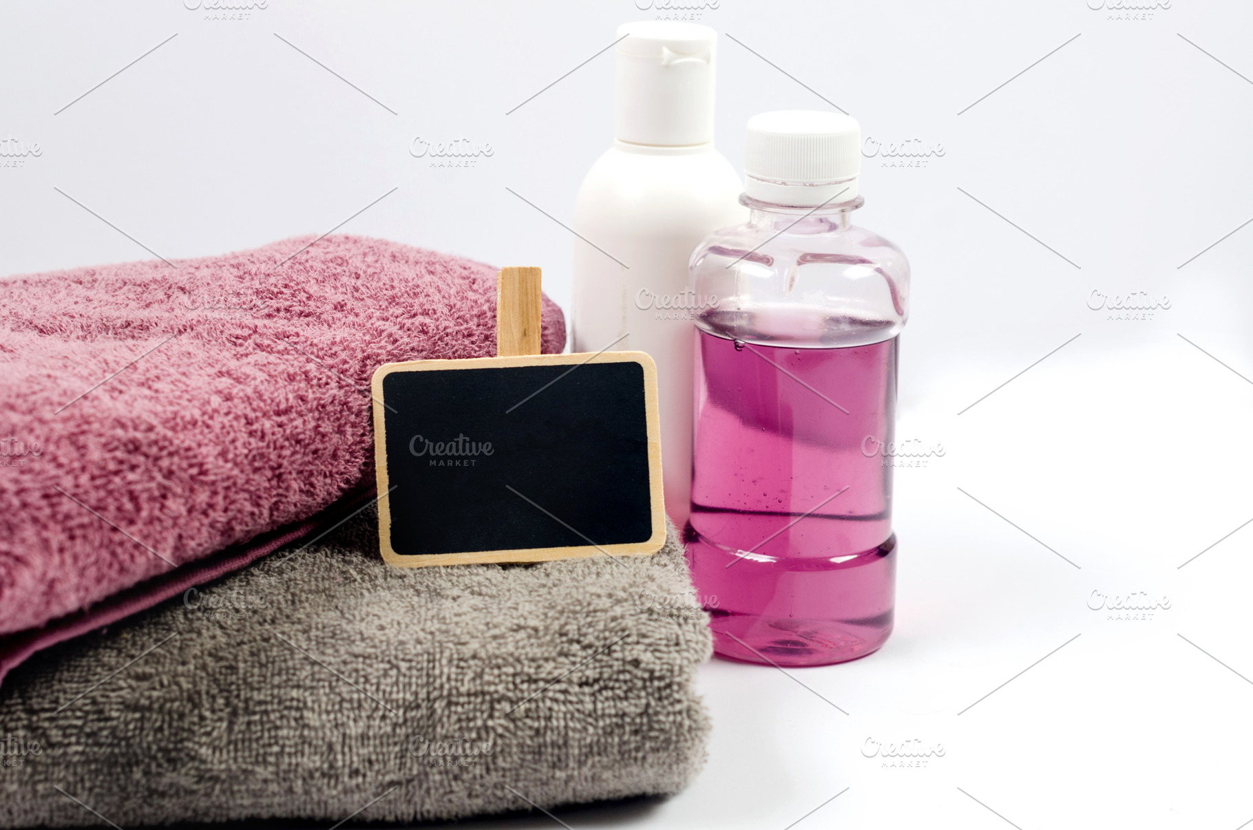 Shower accessories bath items shower gel, shampoo and towels, a Background Photo by vimart