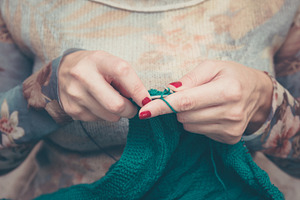 Woman hands knitting green plaid featuring knitting, hand, and knit