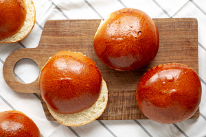 Homemade Brioche Buns Ready to Eat, top view. Flat lay, overhead, a Food & Drink Photo by LiudmylaChuhunova