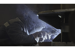 Welder welds metal structures at, an Industrial Photo by Media Whale Stock
