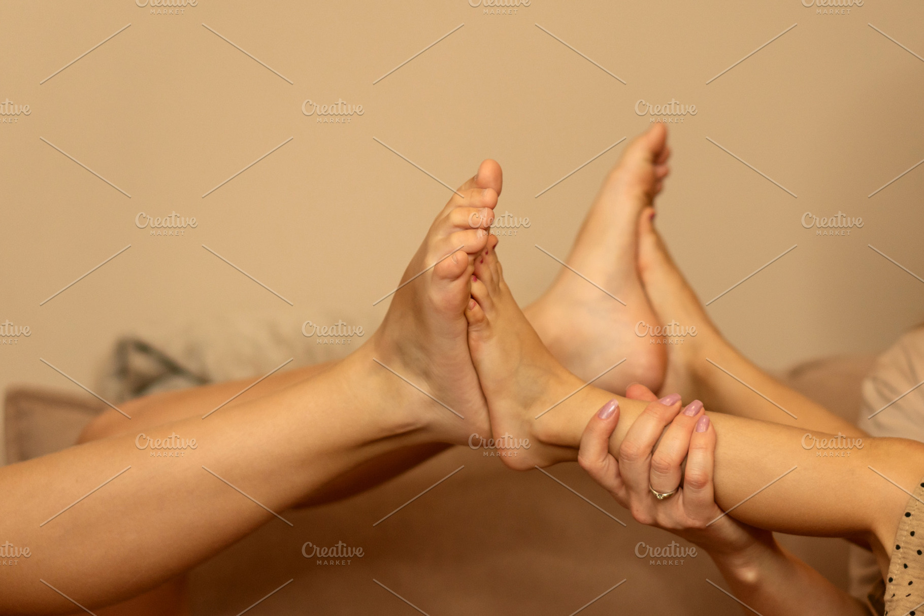 Close-up of children’s feet meeting, a Person Photo by Elena Vagengeim