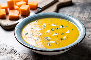 Creamy pumpkin soup with herbs and cream, a Food & Drink Photo by etorres69