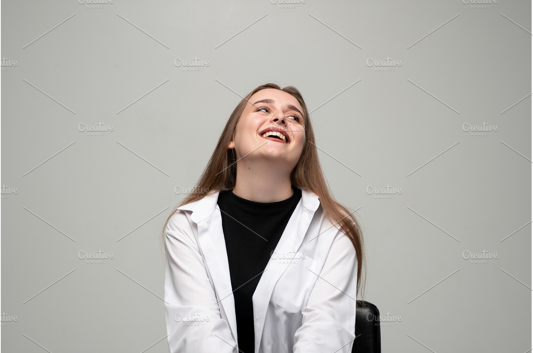 Young woman smiling and laughing, a Person Photo by volodymyrshtun13795