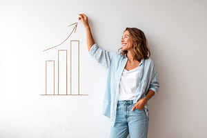 Woman beside drawn bar graph representing growth, a Business Photo by AlyaAnd