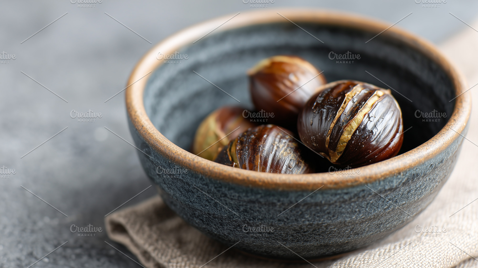 Roasted chestnuts in a rustic bowl, a Food & Drink Photo by MistyDay