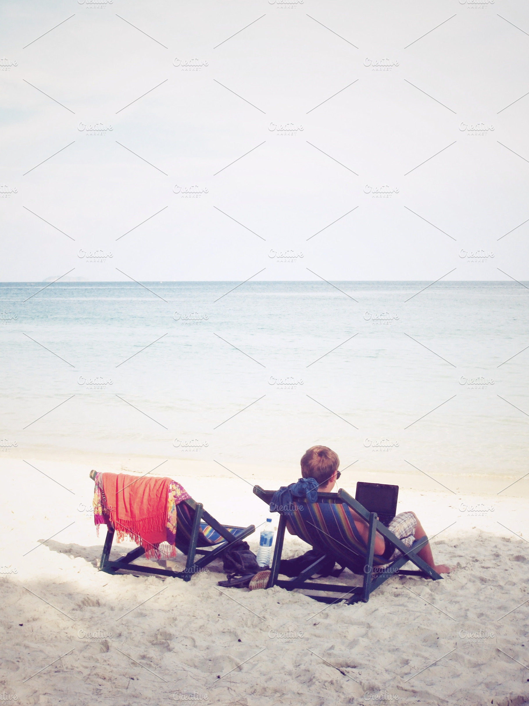 Enjoy Using Laptop On Beach