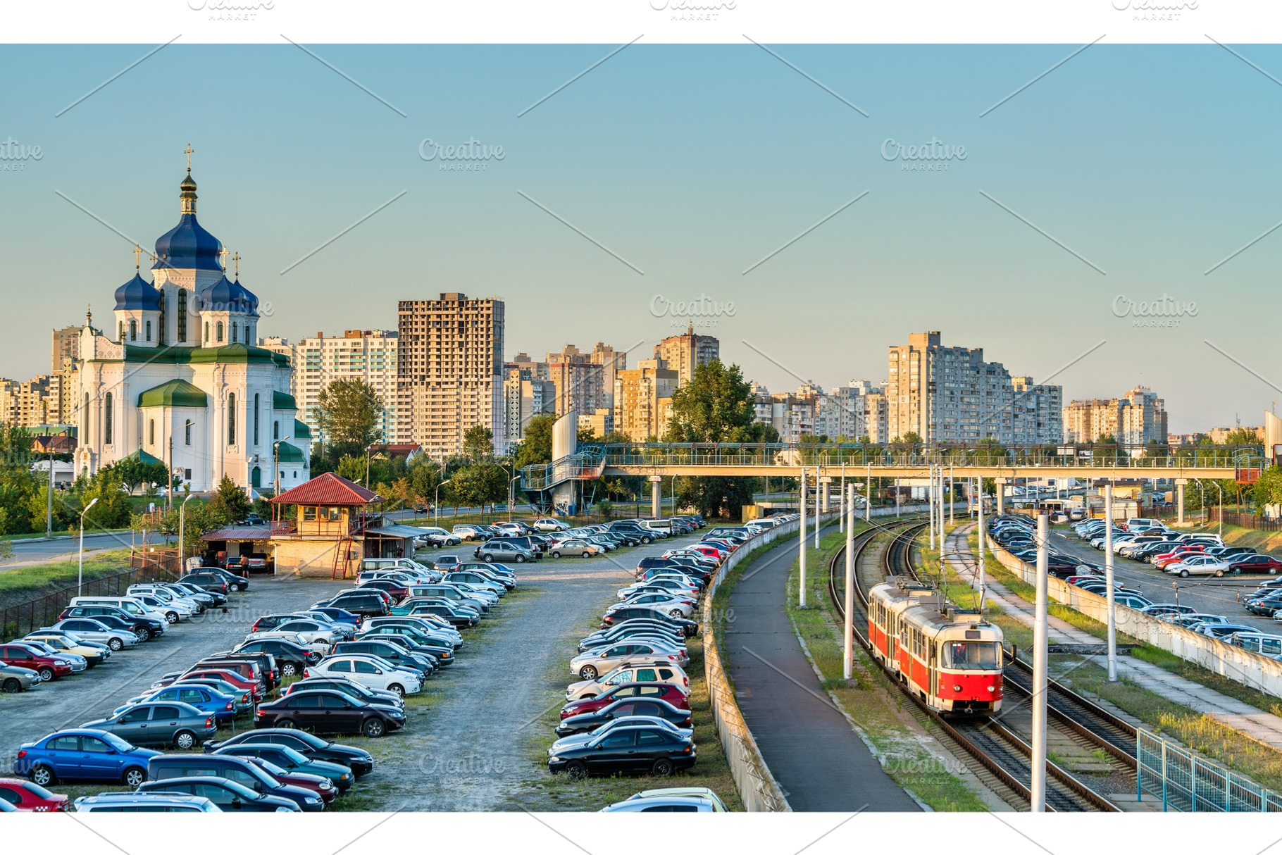 Cathedral of the Holy Trinity and a light rail tram in Troieshchyna -, an Architecture Photo by Leonid Andronov