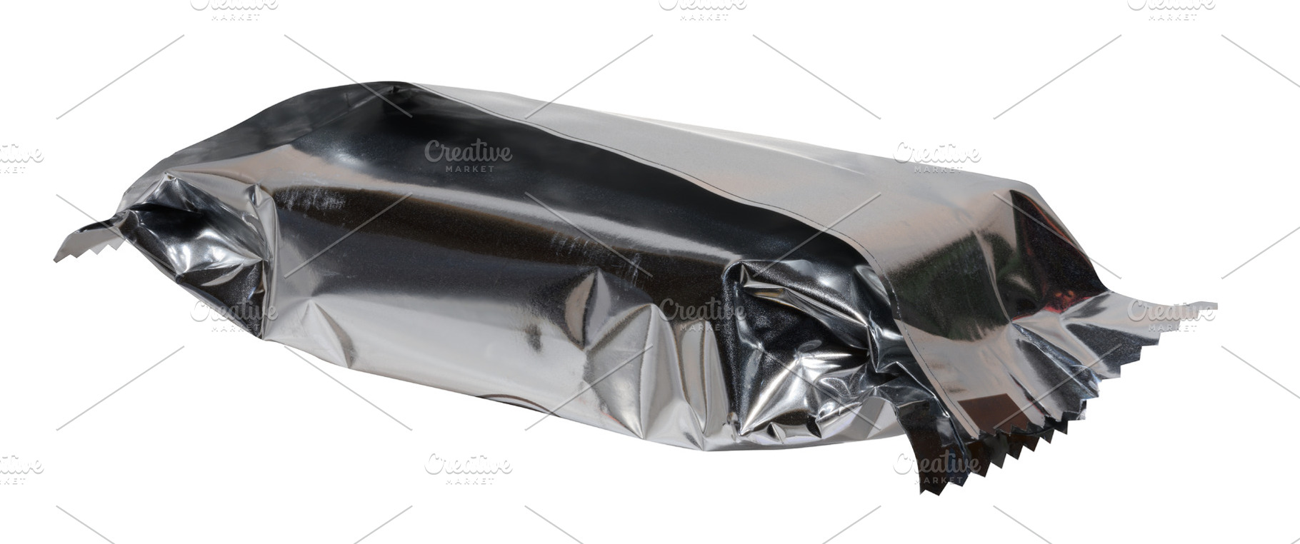 Crumpled silver foil packaging with torn edges, isolated backgro, an Industrial Photo by ndanko