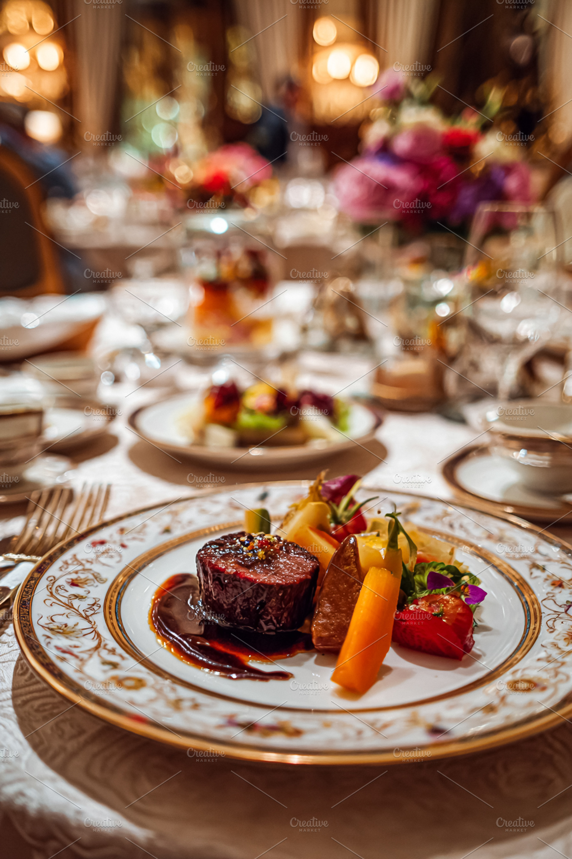 Gourmet fine dining experience plating a tenderloin steak with v, a Food & Drink Photo by Studio ANNA