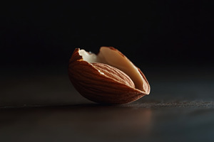 Close up view of unshelled almonds h, a Photo by Iftikhar Alam