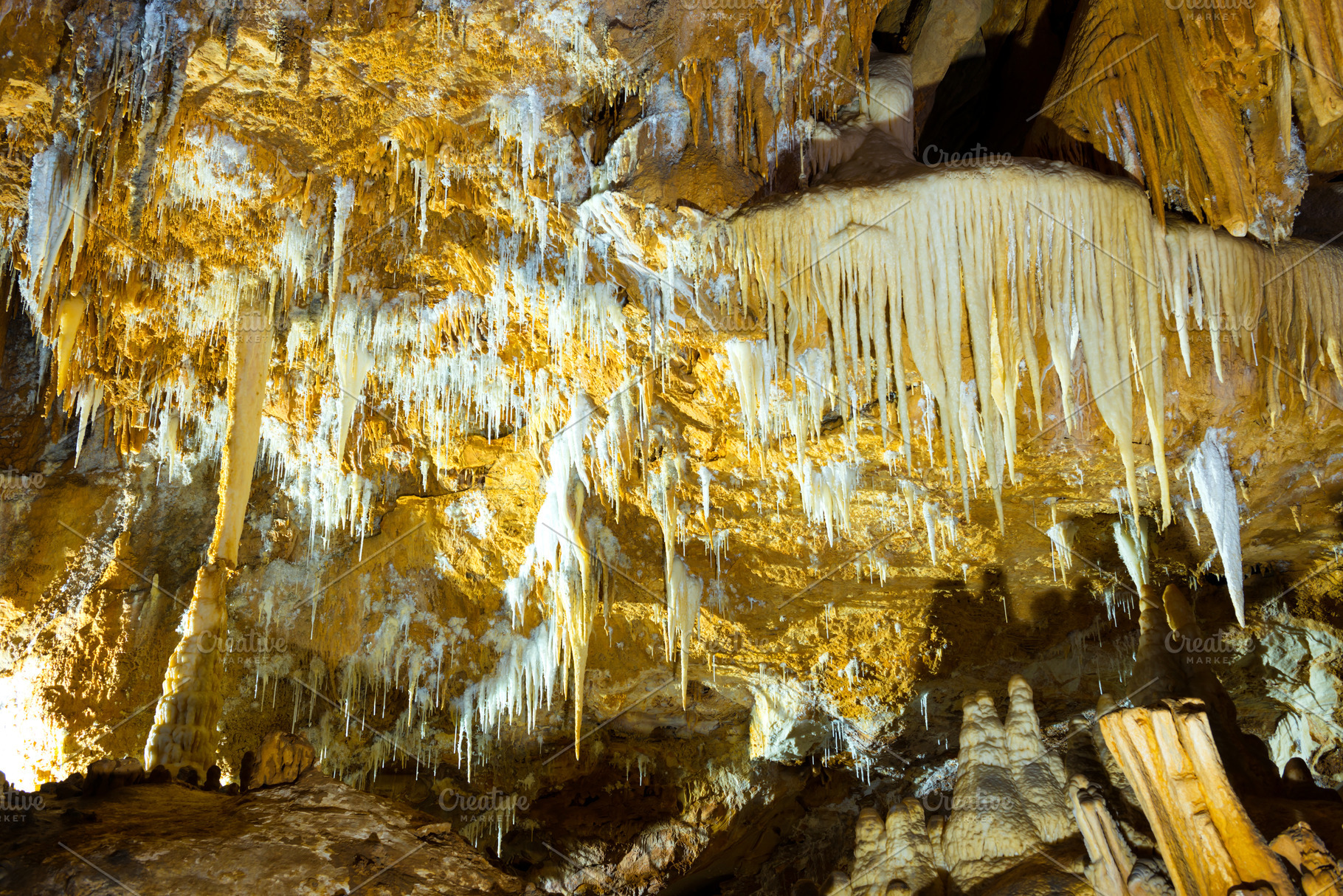 Inside of beautiful dark cave, a Nature Photo by Vapi