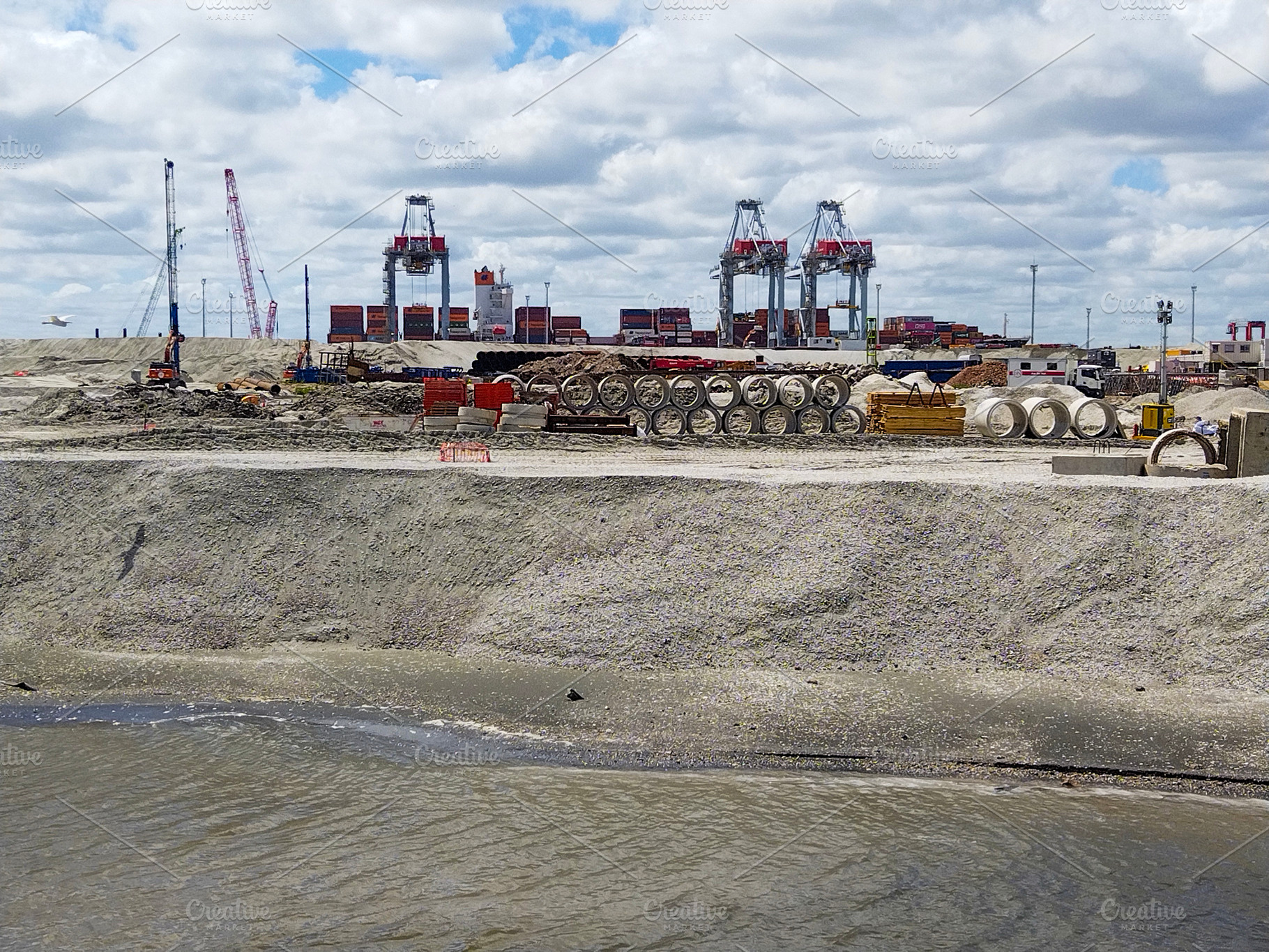 Under construction new part of montevideo industrial port, urugu, an Industrial Photo by DanFLCreativo