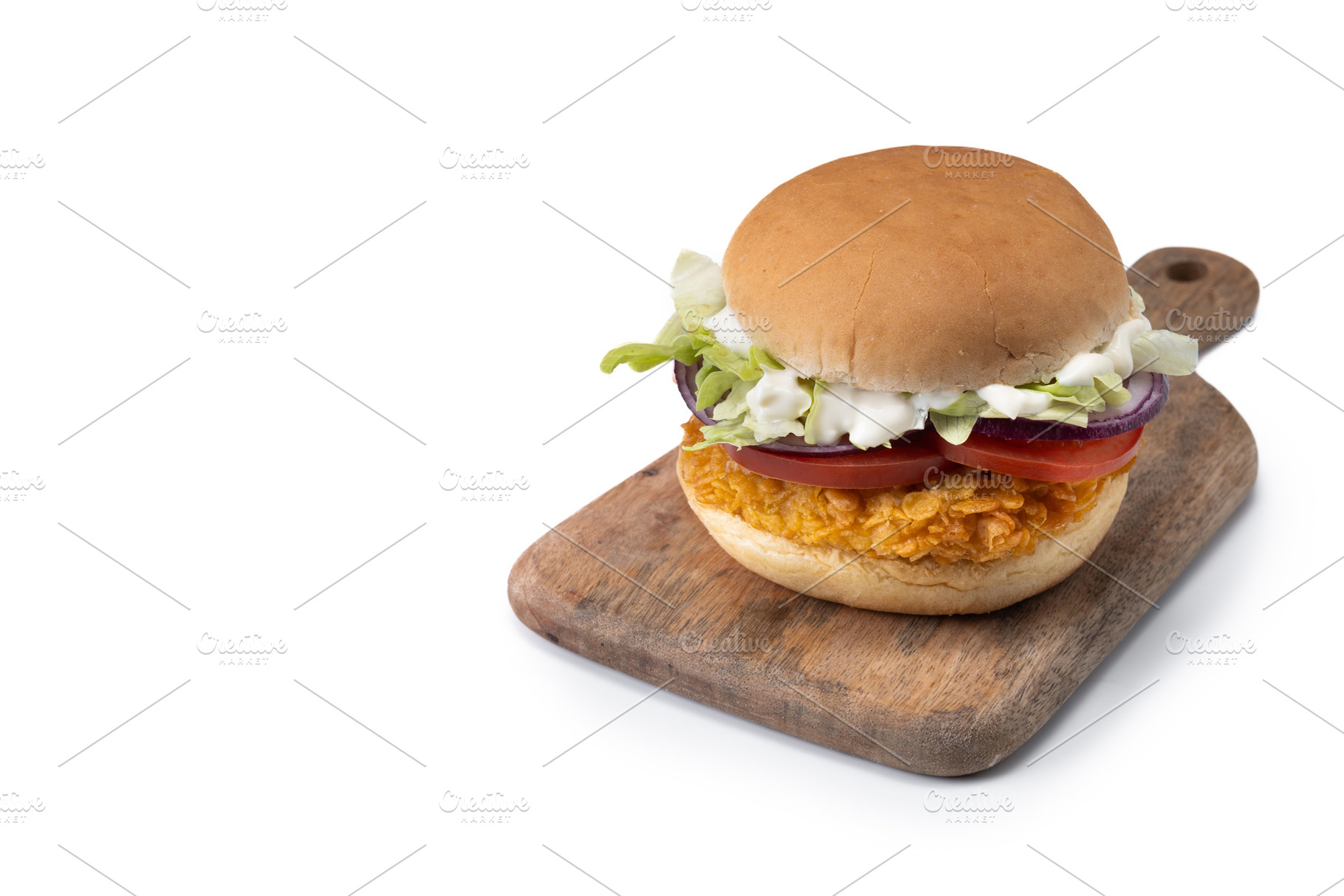 Crispy chicken burger with lettuce,onion,tomato and mayo, a Food & Drink Photo by etorres69