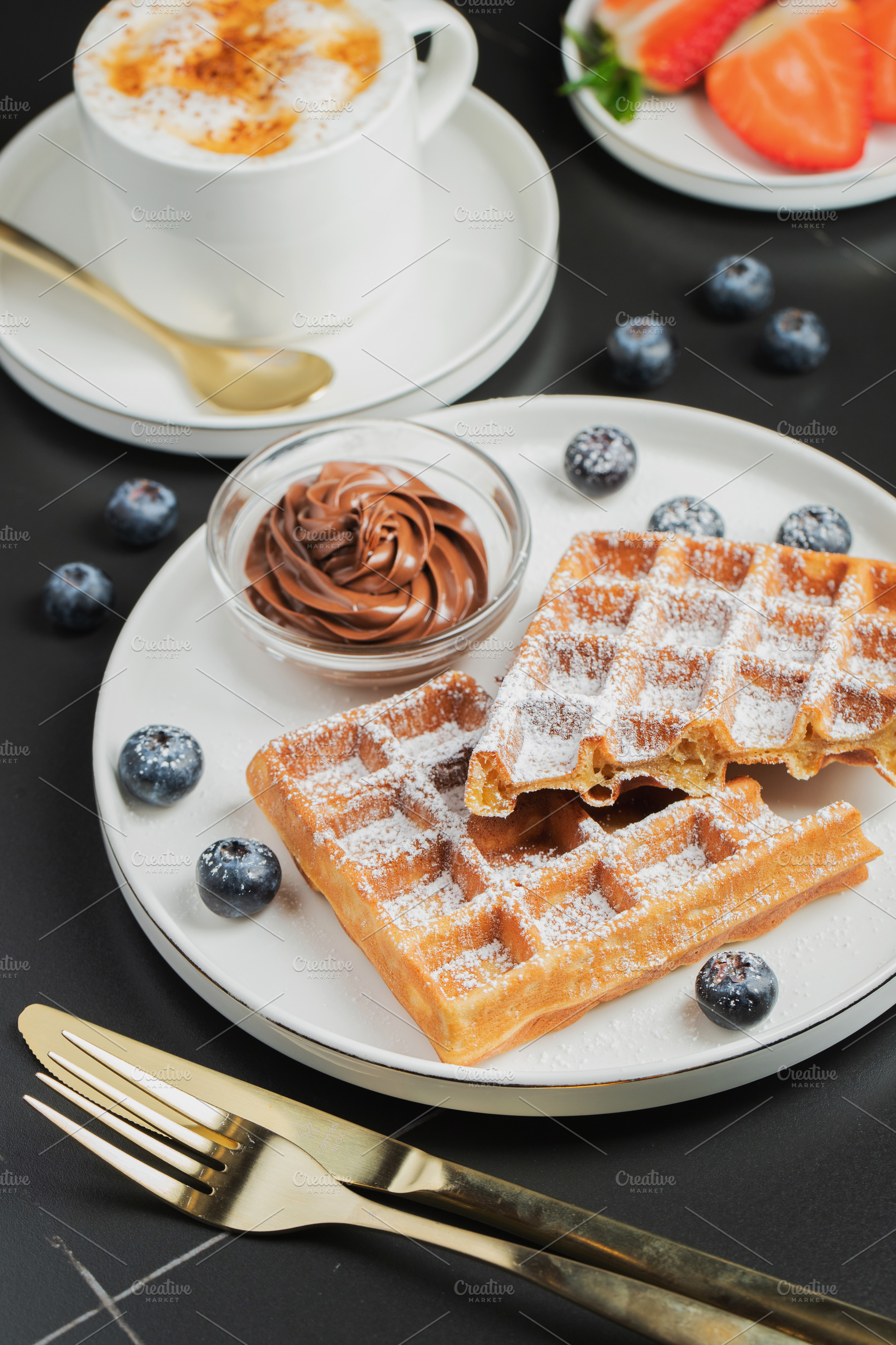 Belgium waffles Homemade waffles with strawberries, a Food & Drink Photo by Budarinphoto