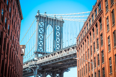 Manhattan bridge between buildings stock photo containing ny and nyc, an Architecture Photo by tydla