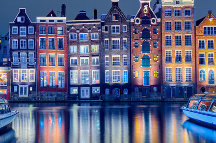 Old brick houses on the canal in Ams