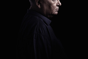 Mature man profile featuring 60s, aged, and black background