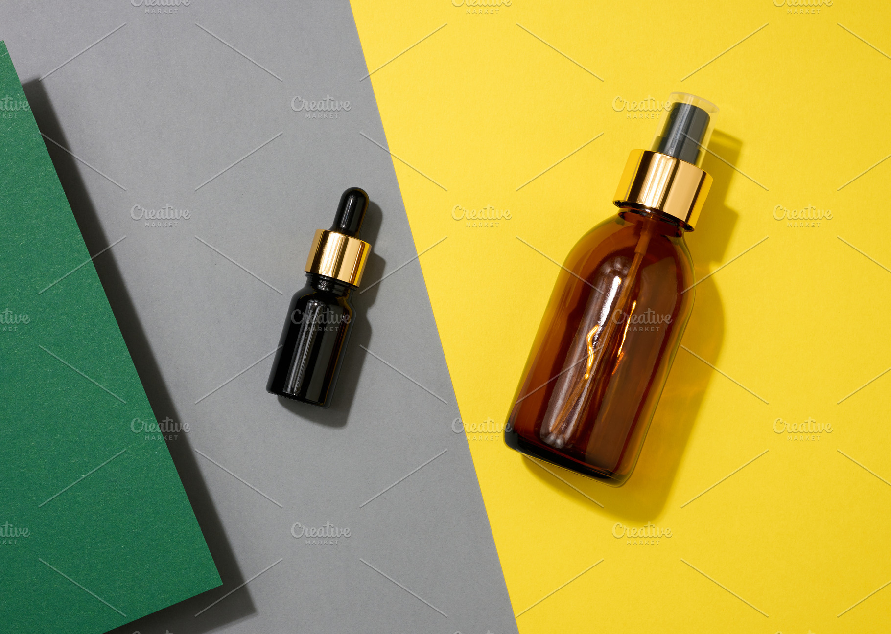 glass cosmetic brown bottles with a pipette on a yellow backgrou, a Beauty & Fashion Photo by ndanko