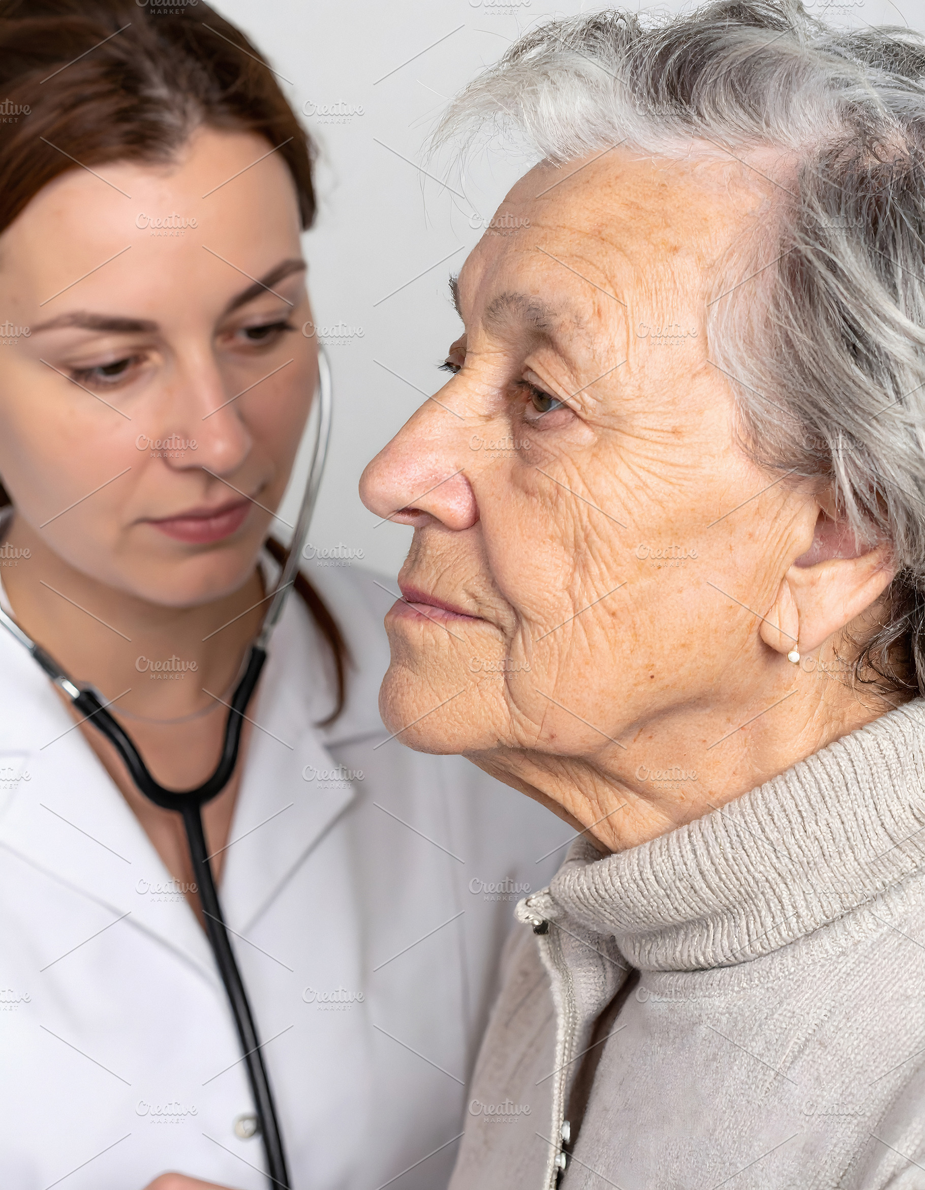 Professional woman doctor advising patient with medical expertis, a Health & Medical Photo by GoodGoods