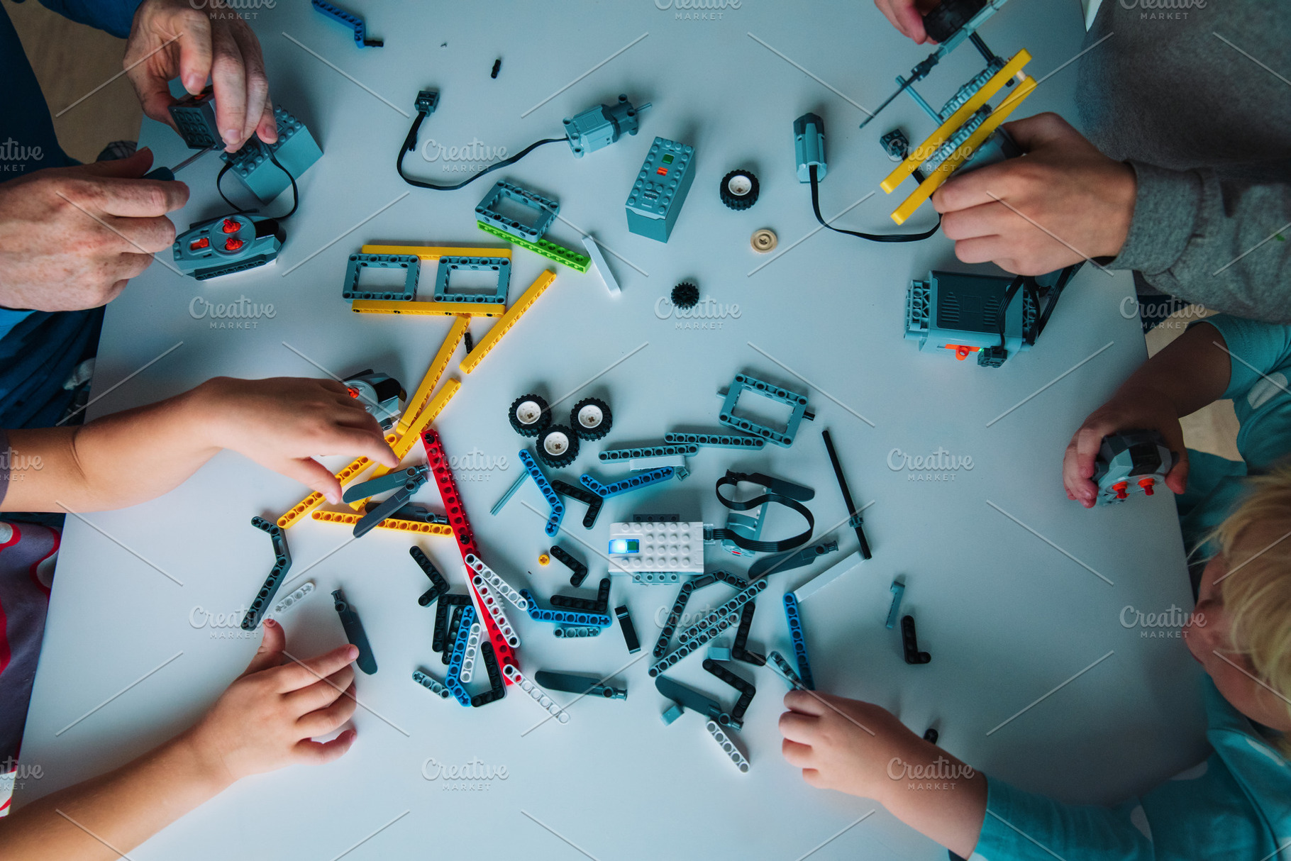 Kids building robot stock photo containing activity and stem, a Person Photo by Nadezhda_Prokudina