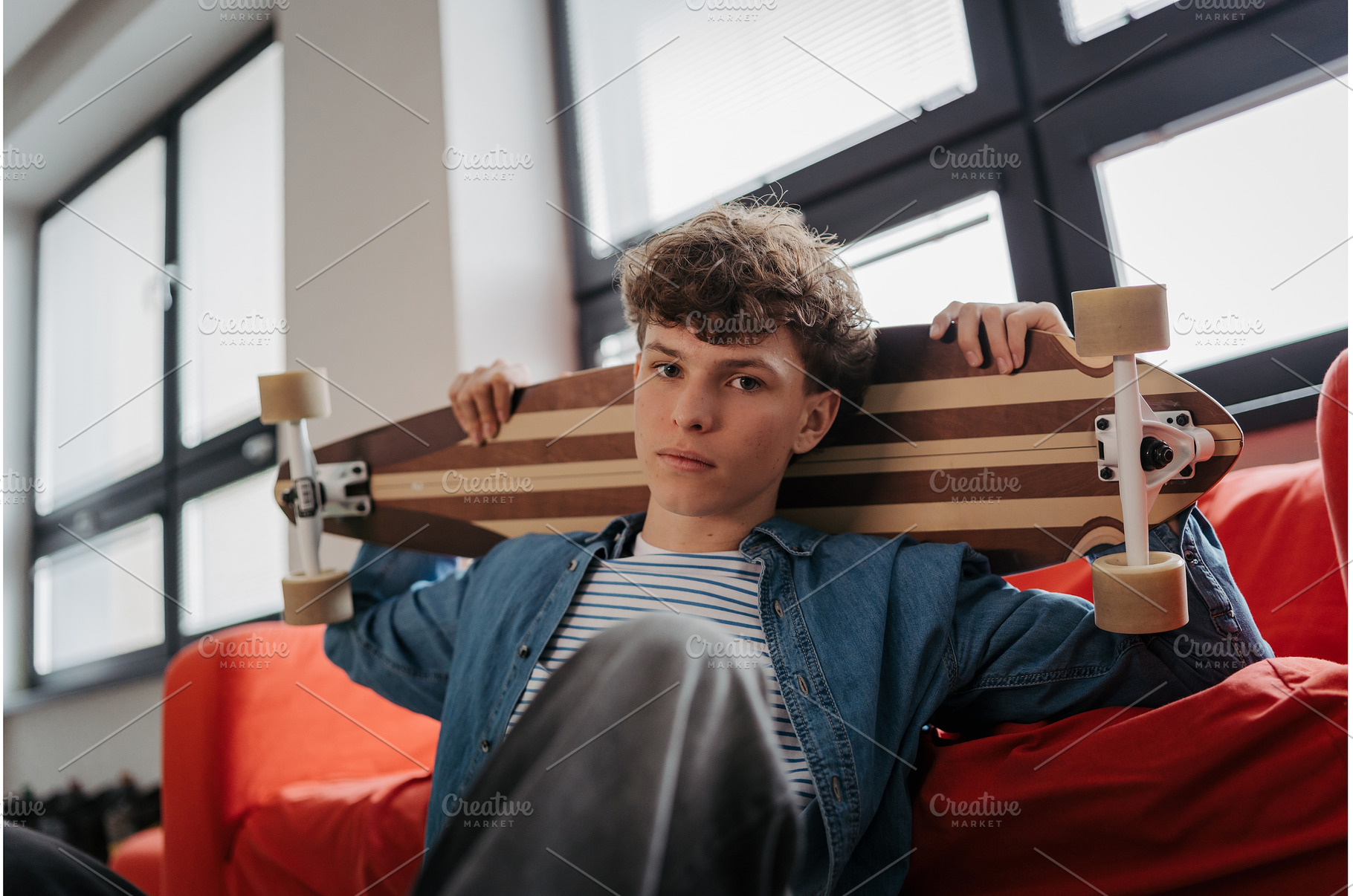 High school student chilling with, a School & Education Photo by HalfPoint