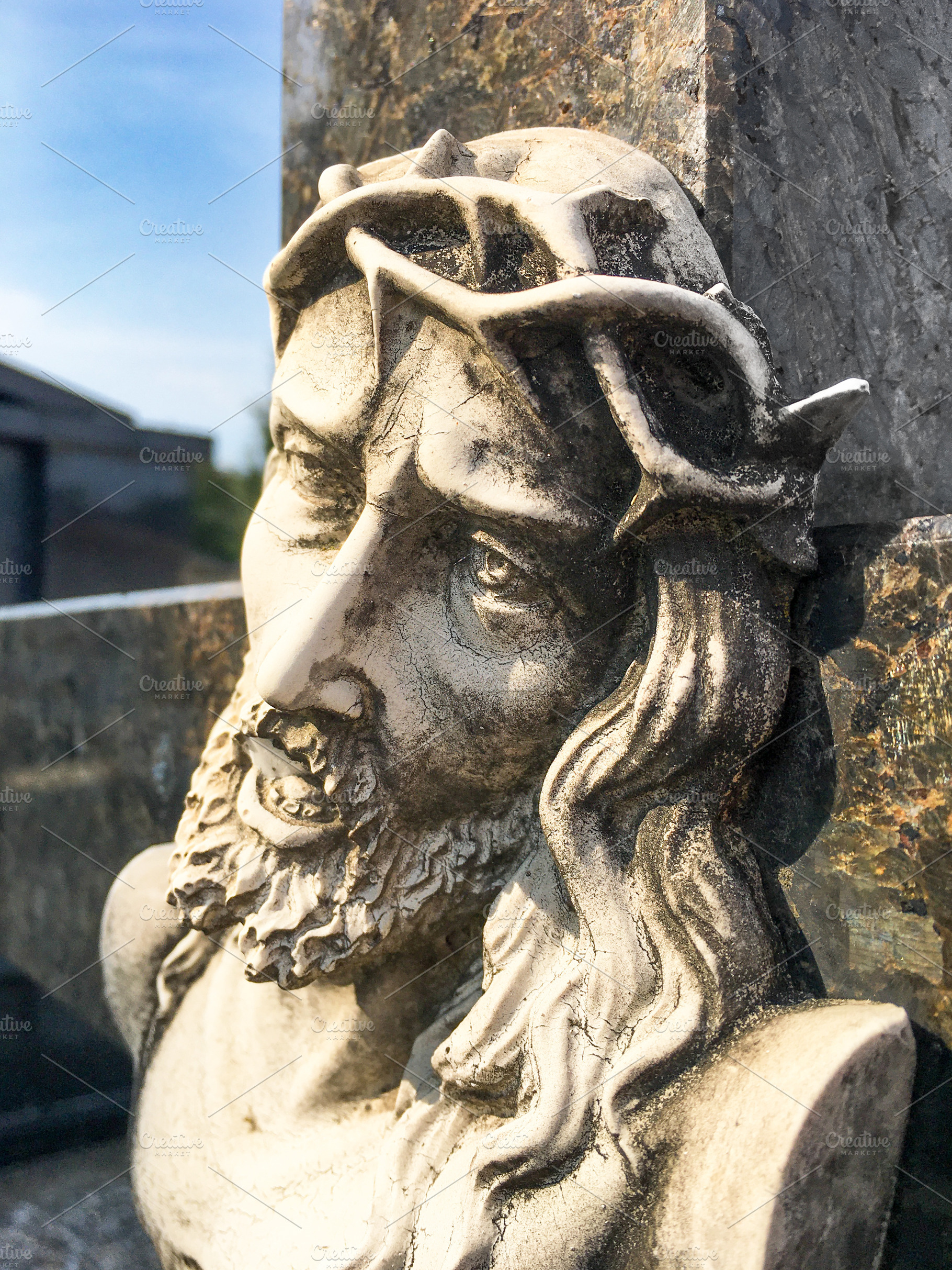 Jesus stone statue, a Wallpaper Photo by KYNA STUDIO