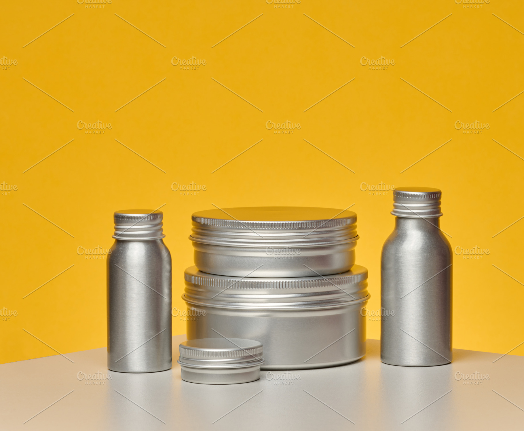 Aluminum jars and bottles for cosmetics and care. Minimalistic p, a Beauty & Fashion Photo by ndanko