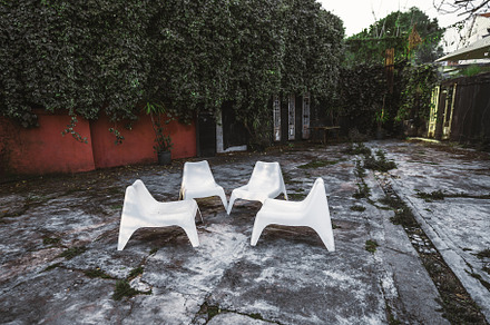 Abandoned courtyard and white chairs, an Architecture Photo by SkyNext