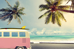 Car on the beach with a surfboard containing surfing, surf, and surfboard