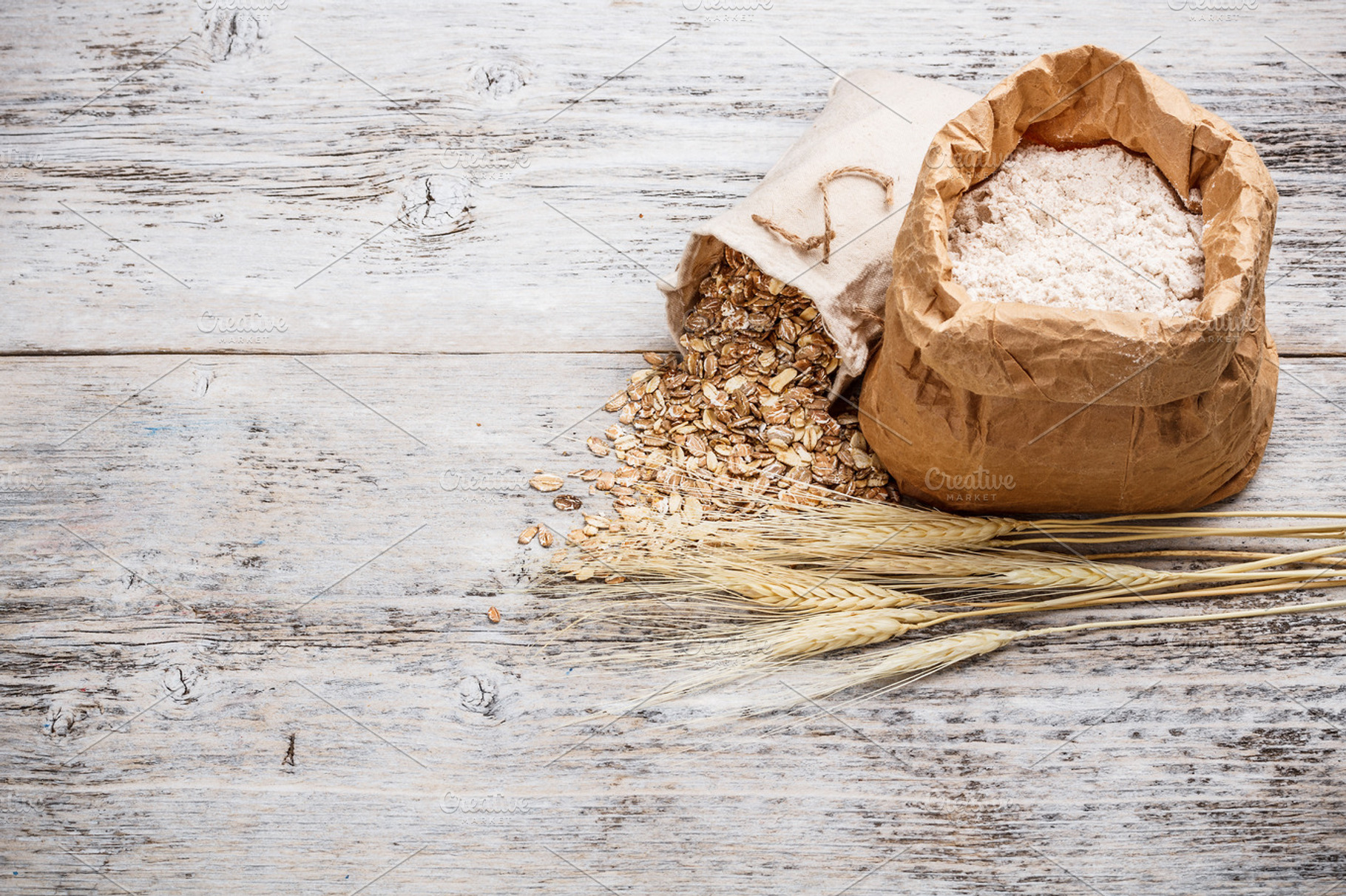 Flour and oat flakes featuring bag, canvas, and cereal
