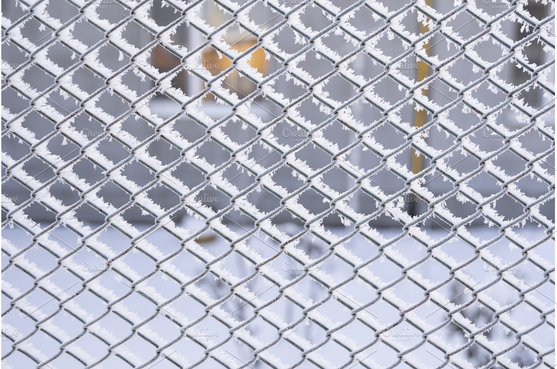Frost-covered steel fence pattern, a Background Photo by volodymyrshtun13795