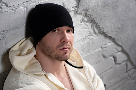 Man in black beanie and fleece hoodi