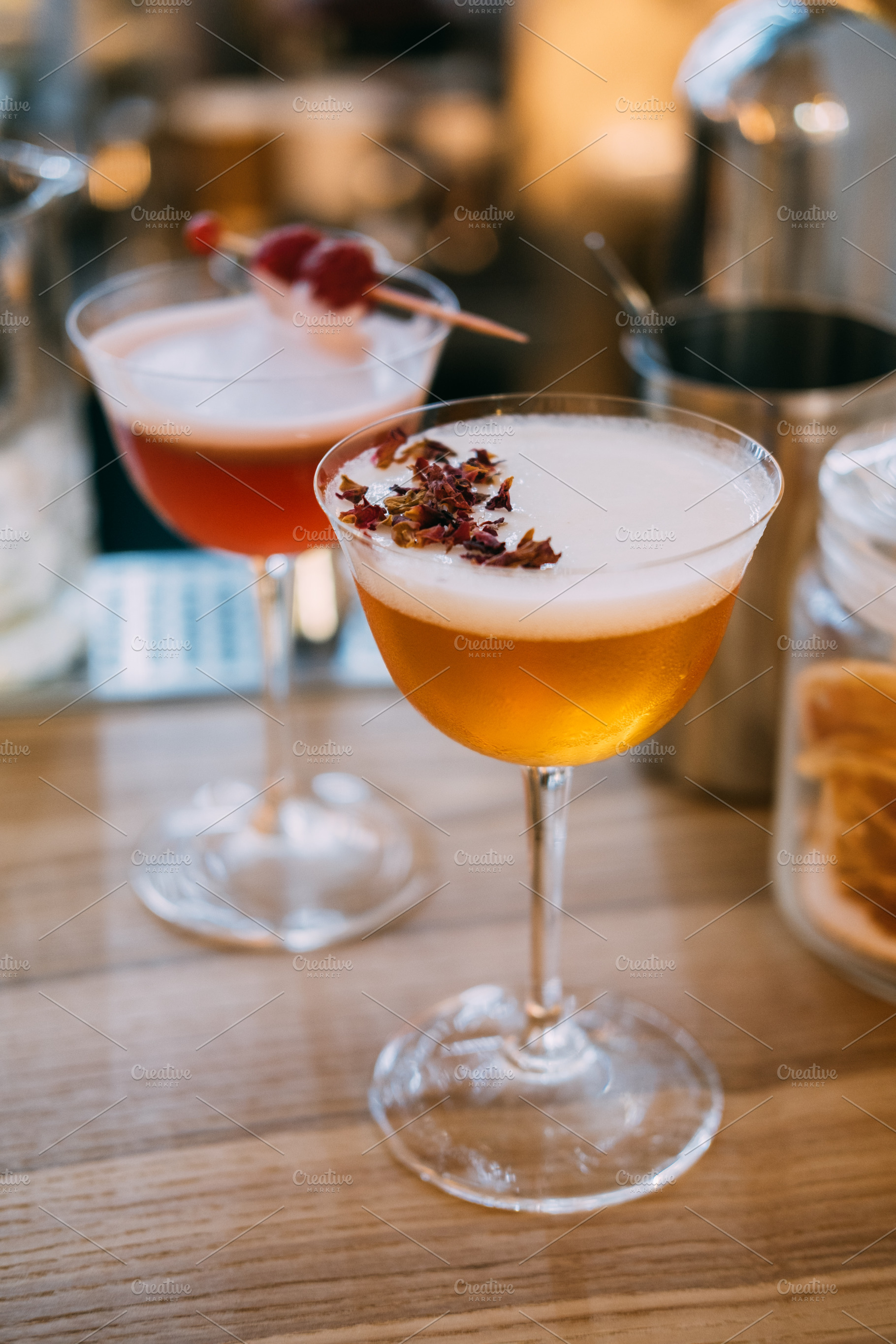 Garnished cocktail refreshing liquor mix table, a Food & Drink Photo by Photo Drive Studio