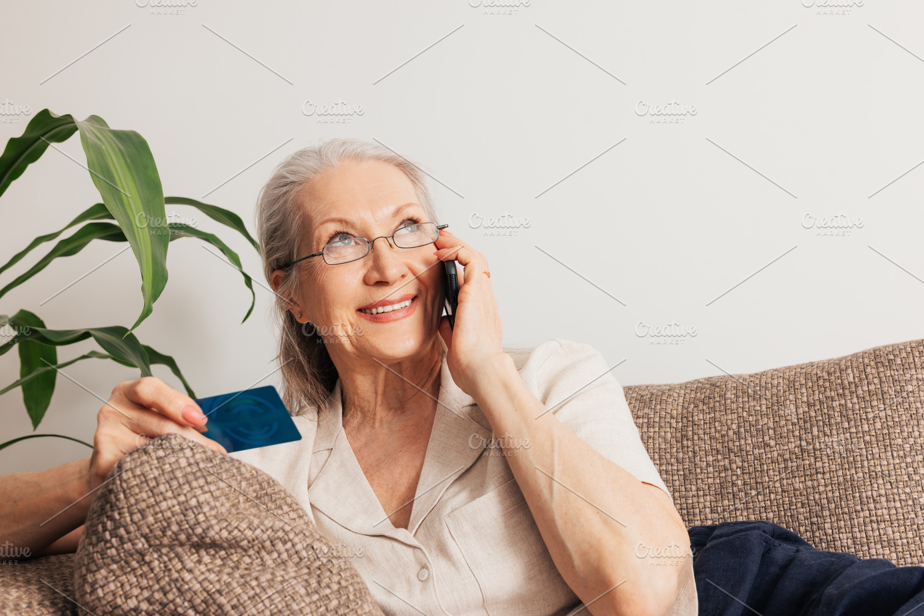 Smiling senior woman ordering, a Person Photo by Artem Varnitsin