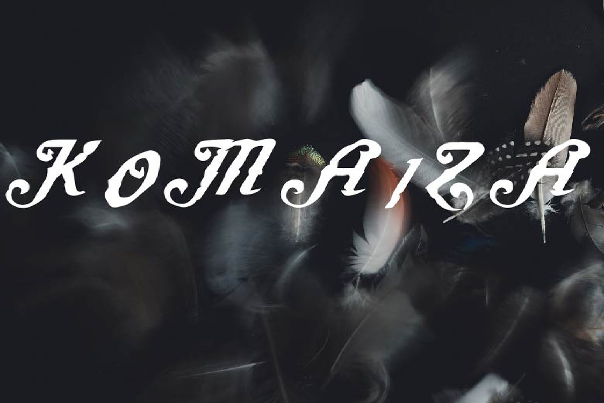 Komaiza Font, a Script Font by Dz Akali (Photo 1 of 4)