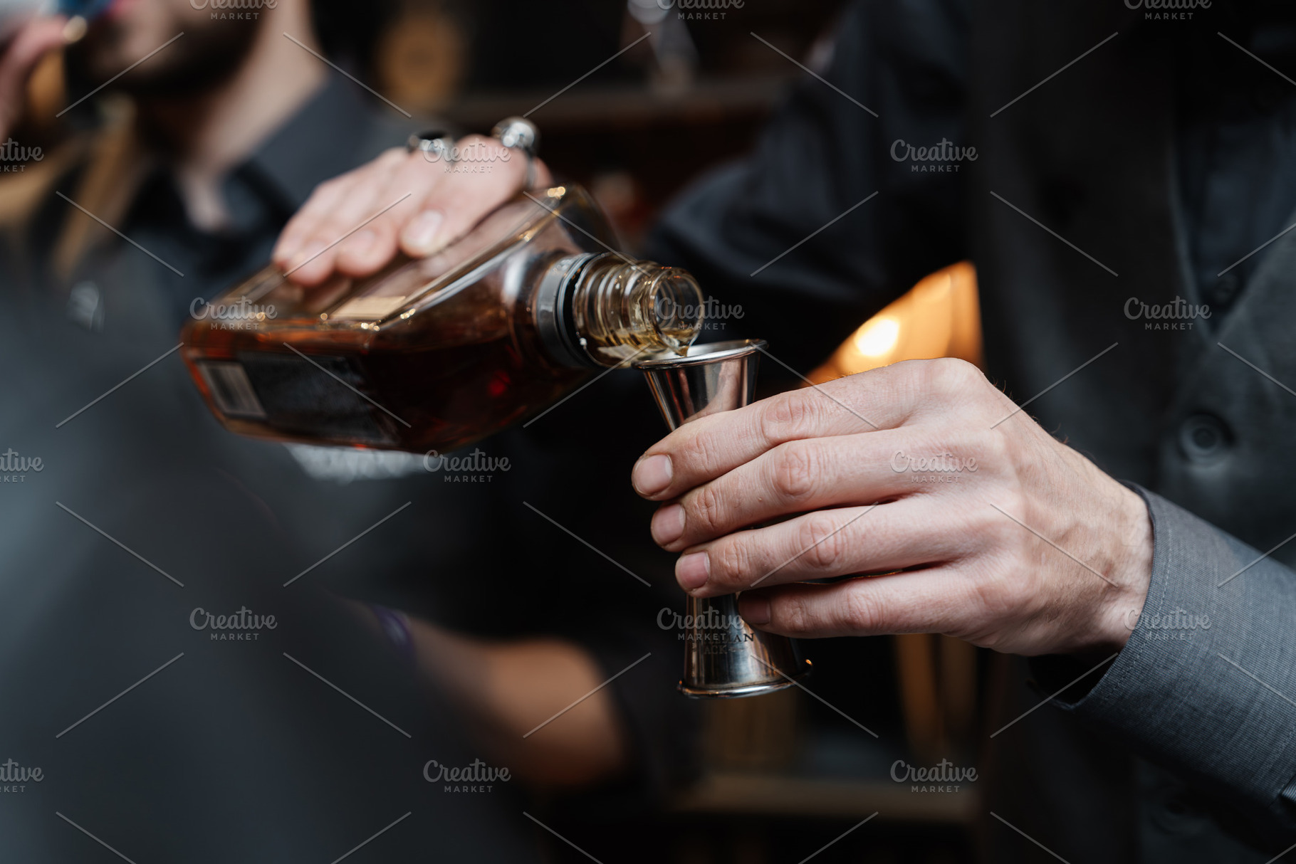 Bartender pours whiskey for tasting., a Food & Drink Photo by Rov.7