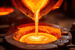 Molten Metal Pouring Into Furnace Crucible at Foundry, an Industrial Photo by AlyaAnd