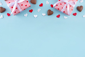Romantic Valentine day background with hearts, gift boxes, heart, a Holiday Photo by Rimma