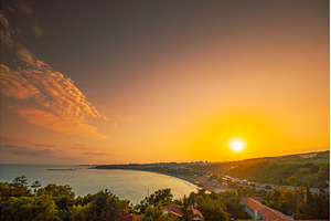 Sunset Over Coastal Bay with Golden, an Architecture Photo by Our Amazing World