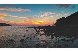 Tourists enjoying sunset at Koh Ma, a Nature Photo by Goinyk