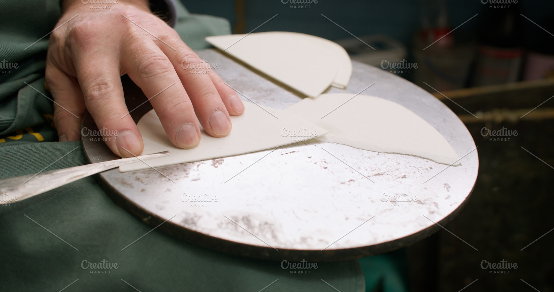 Professional artisan cobbler workplace material, a Person Photo by Photo Drive Studio