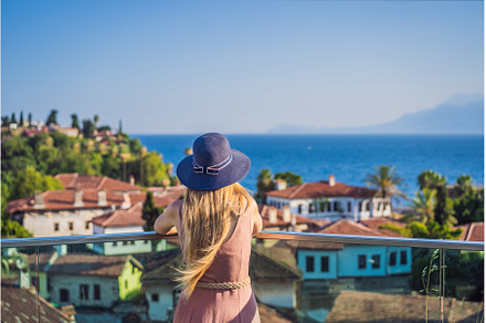 Woman tourist in Old town Kaleici in, an Architecture Photo by Elizaveta Galitskaya