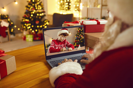 Santa Claus video calling little boy, a Holiday Photo by StudioRomantic