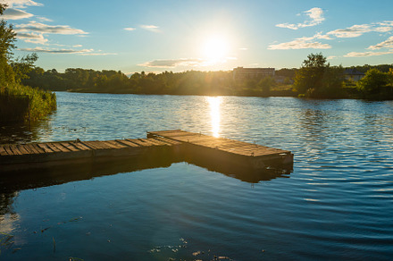 Wooden mooring bridge at sunset, a Nature Photo by Vapi